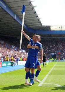 Jamie Vardy and Kasey McAteer celebrating a goal.