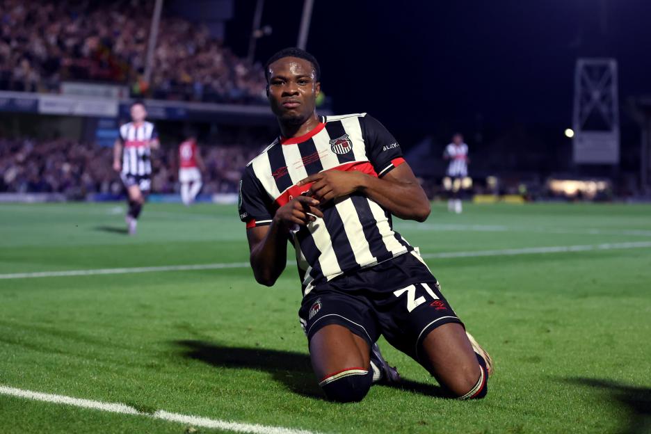 Soccer player Tyrell Warren celebrating a goal.