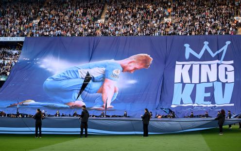 A large banner depicting Kevin De Bruyne with 