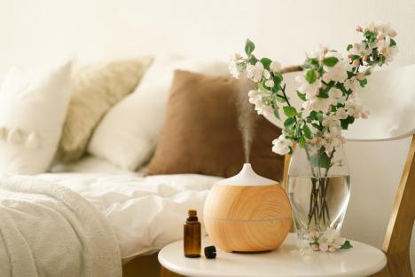Aromatherapy diffuser on a bedside table.