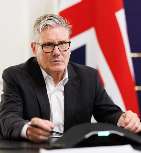 Keir Starmer making a phone call in 10 Downing Street.