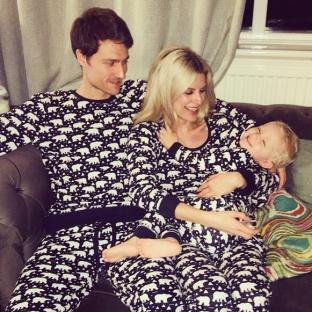 Family in matching polar bear pajamas.