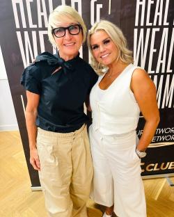 Photo of two women standing together.
