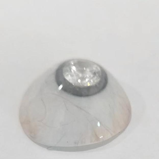 Artificial eye with a faceted gemstone as the iris, similar to the one worn by James Bond villain Zao.