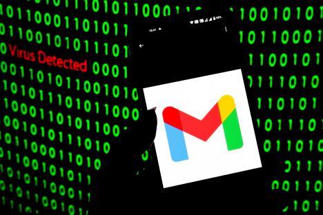 Photo illustration of a Gmail logo on a smartphone screen with a