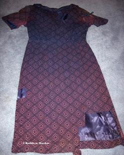 Betty Hill's dress with fabric samples removed for analysis.