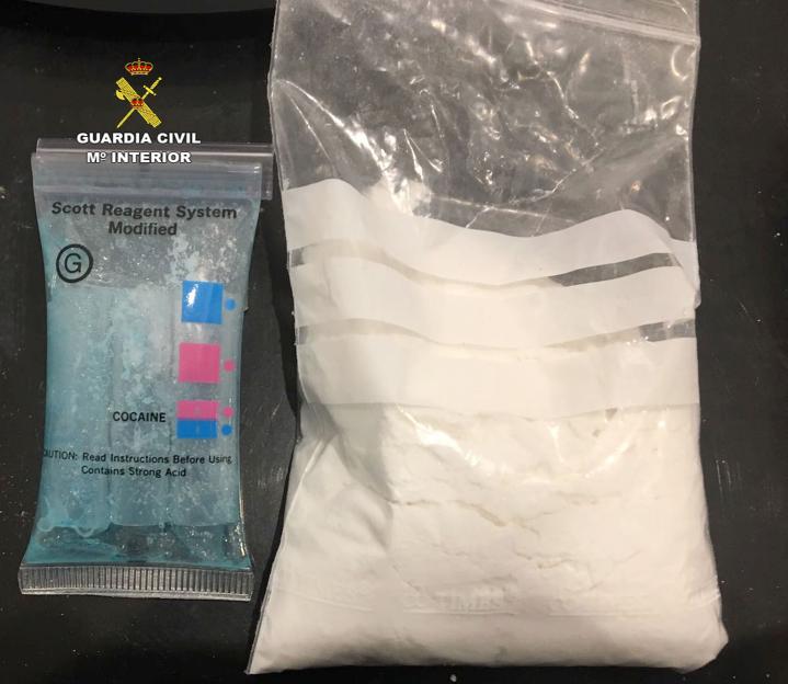 Cocaine and a drug testing kit.