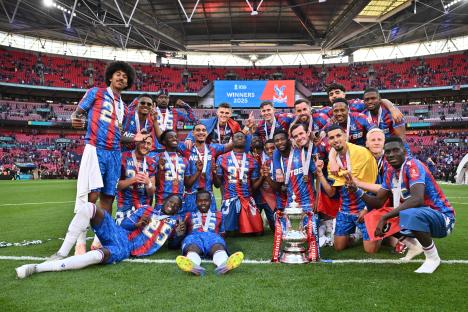 Crystal Palace F.C. team celebrating with the FA Cup trophy.