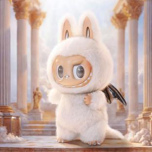 Labubu doll in a white furry costume with bat wings.