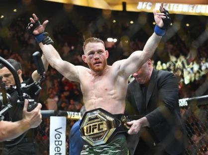 Jack Della Maddalena celebrates his UFC welterweight title win.