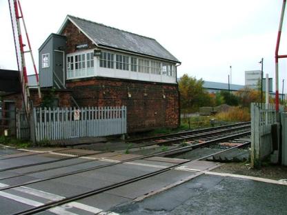 Heighington railway station signal box and level crossing.