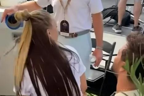 Moment JoJo Siwa is caught sitting on Chris Hughes’ lap LIVE on US TV as Dance Moms star brands him ‘a hot guy’