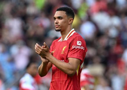Trent Alexander-Arnold of Liverpool applauding fans.