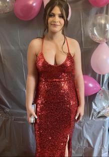 Kiea McCann in a red sequined dress.