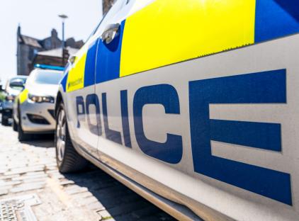 Teen, 19, fighting for life after falling from balcony ‘while fleeing cops’ as boy, 14, raced to hospital
