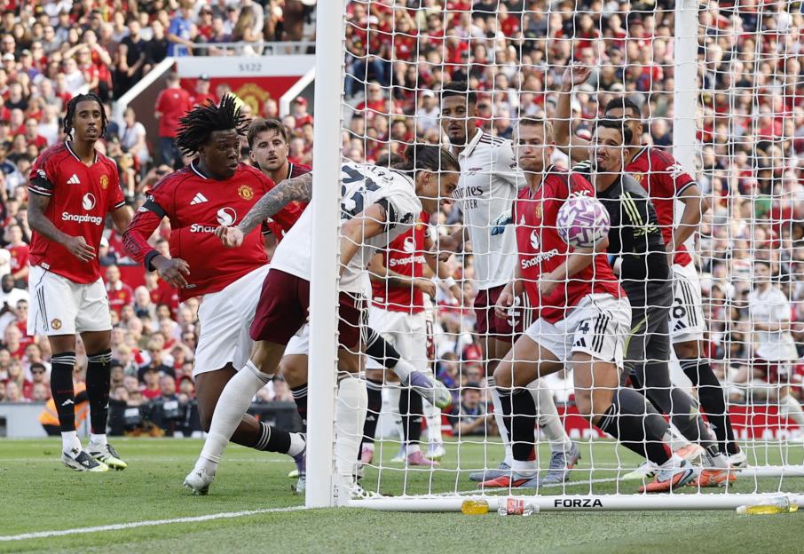 Arsenal's Riccardo Calafiori scoring a goal.