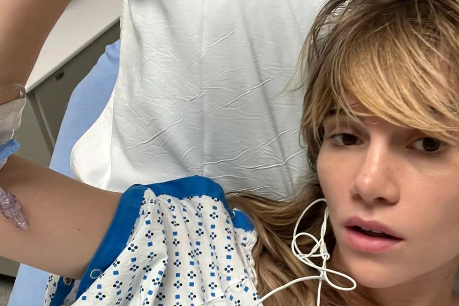Suki Waterhouse reveals she’s in hospital with nasty injury caused by ‘wearing too tight trousers’ onstage
