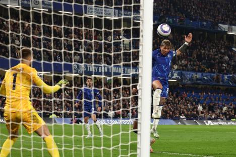 Enzo Fernández scoring a goal for Chelsea.