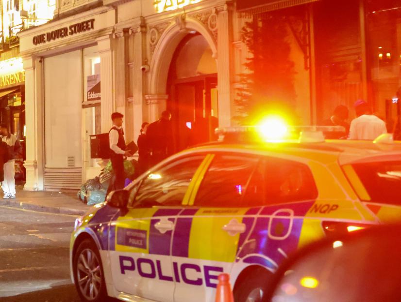 Police car outside Tabu nightclub in London following a machete attack.