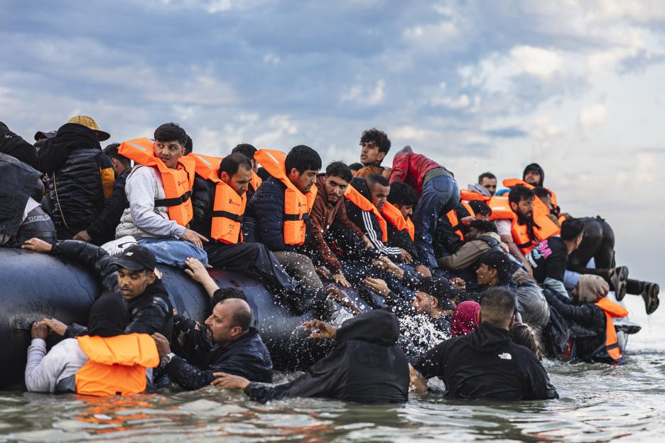 Migrants in a boat crossing the English Channel.