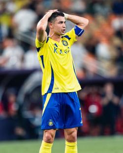 JEDDAH, SAUDI ARABIA - APRIL 30: Cristiano Ronaldo #7 of Al Nassr looks disappointed after his missed chance during the AFC Champions League Elite Semi-finals match between Al Nassr v Kawasaki Frontale at King Abdullah Sports City Hall Stadium on April 30, 2025 in Jeddah, Saudi Arabia. (Photo by Clicks Images/Getty Images)