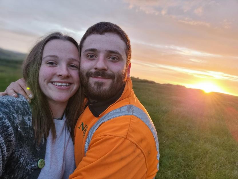 Photo of Libby Ramsden and Ollie, a couple who live off-grid.