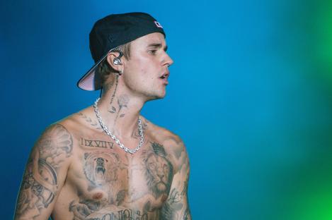 Justin Bieber performing at a music festival.