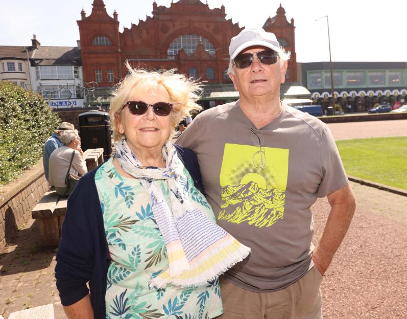Older couple standing in Morecambe.