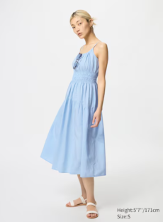 Model wearing a light blue midi dress.