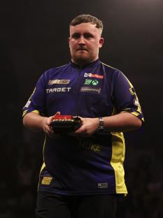 Luke Littler at a darts match.