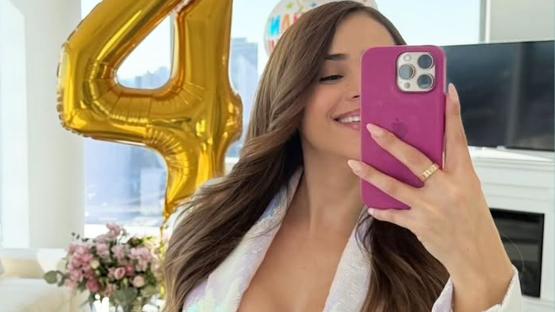 Mexico’s sexiest fan and weather girl poses in bra and dressing gown as she celebrates four years on OnlyFans