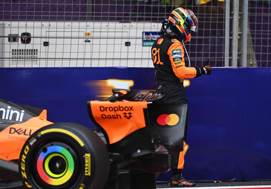 Oscar Piastri of Australia walks away from his McLaren after crashing at the F1 Grand Prix of Azerbaijan.