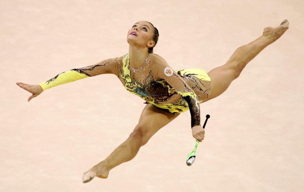 Alina Kabaeva performing rhythmic gymnastics.