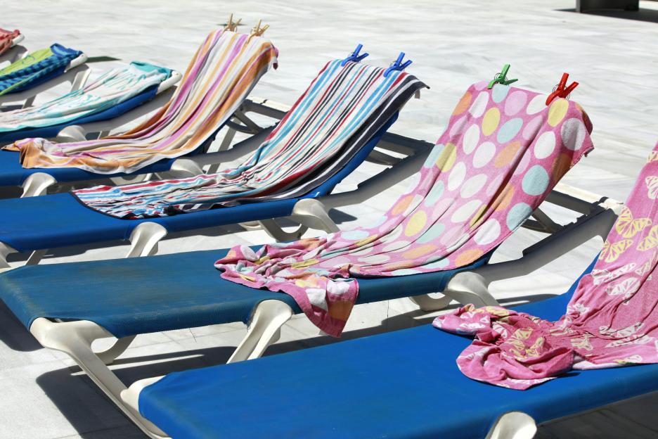 Sun loungers by a hotel pool in Kyrenia, North Cyprus.