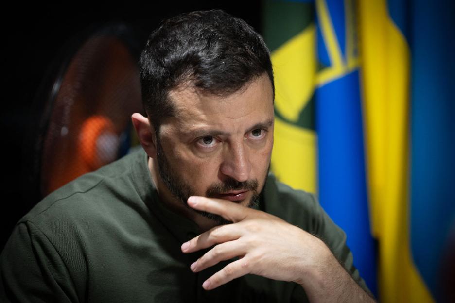 President Zelenskyy looks on pensively.