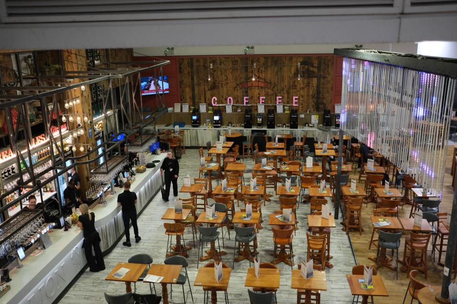 Empty Wetherspoon's Red Lion pub at Gatwick Airport, ready to open.