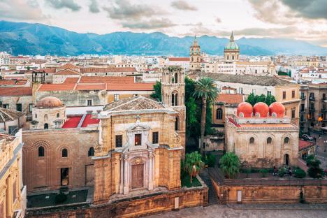 Elevated view of Piazza Bellini in Palermo, Italy, showing Santa Maria dell'Ammiraglio and Chiesa di San Cataldo.