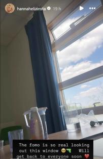 Hospital room view with window showing a cloudy sky.