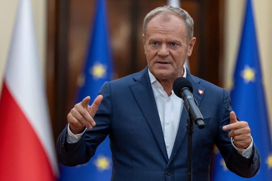 Donald Tusk addressing a press conference.