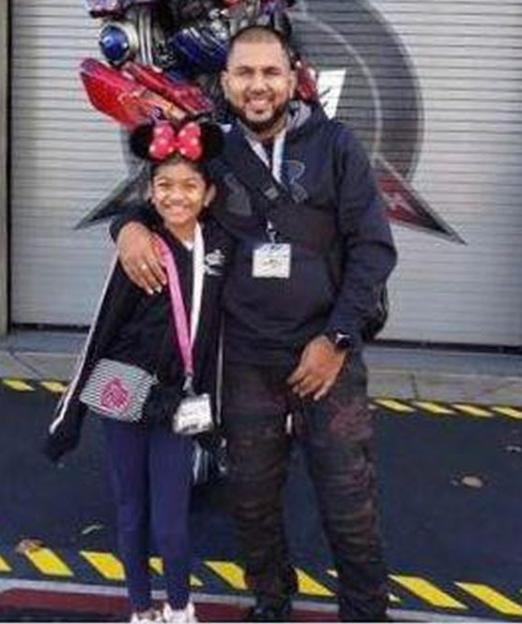 Photo of Roopesh Rajkumar and his daughter Riya.