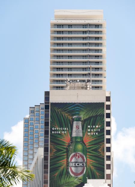 Beck's beer billboard on a building.