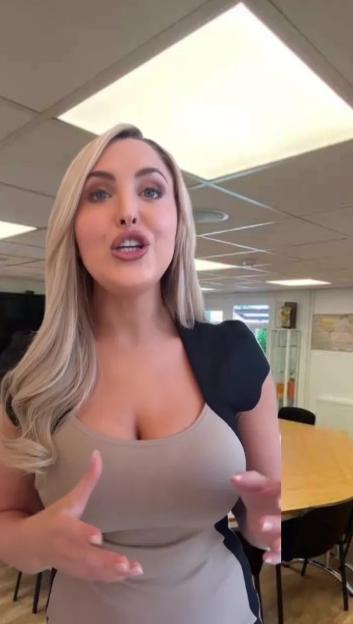 Woman speaking in an office.
