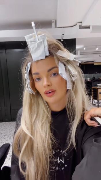 Helena Ford with foils in her hair at a hair salon.