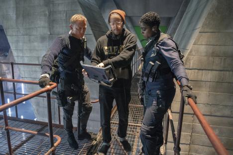 Daniel Craig, Cary Joji Fukunaga, and Lashana Lynch on the set of No Time to Die.