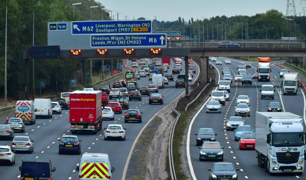 M6 closed after lorry overturns and dumps fuel on motorway as rush hour drivers face long delays