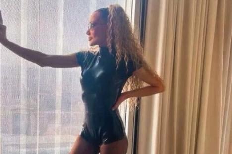 90s pop megastar has barely aged a day as she stuns in tiny leather catsuit after health battle – can you guess who?