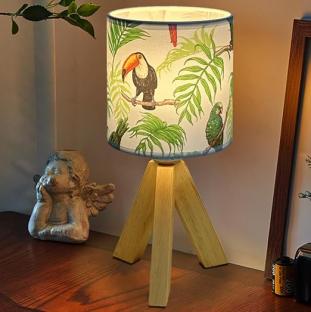 Table lamp with tropical bird print shade.
