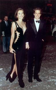 Hugh Grant and Elizabeth Hurley at a film premiere.