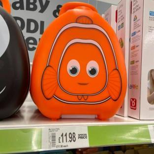 Orange My Carry Potty travel potty shaped like Nemo.