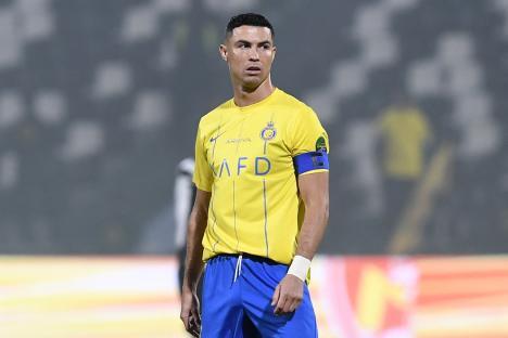 Nassr's Portuguese forward #07 Cristiano Ronaldo looks on during the King Cup quarter-final football match between Al-Shabab and Al-Nassr at the Al-Shabab Club Stadium in Riyadh on December 11, 2023. (Photo by AFP) (Photo by STR/AFP via Getty Images)
